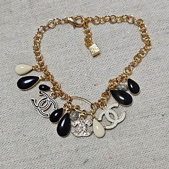 CHANEL Jewelry - Vintage 100% Authentic Chanel Logo CC Gold Plated Charm Bracelet